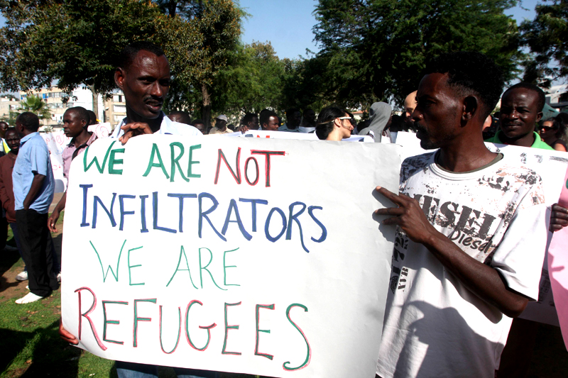 African refugees protesting mistreatment at a rally in Israel recently