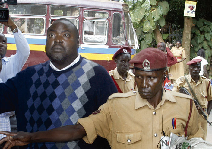 Former NSSF boss David Chandi Jamwa is escortedat the Anti-Corruption Court officers 