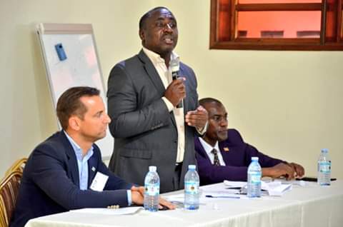 Minister for Agriculture Christopher Kibanzanga in company of CRS Uganda Country Representative, Niek De Geoiji engage farmers from Rwenzori sub-region on vanilla farming practices. (PHOTO/PML daily) 