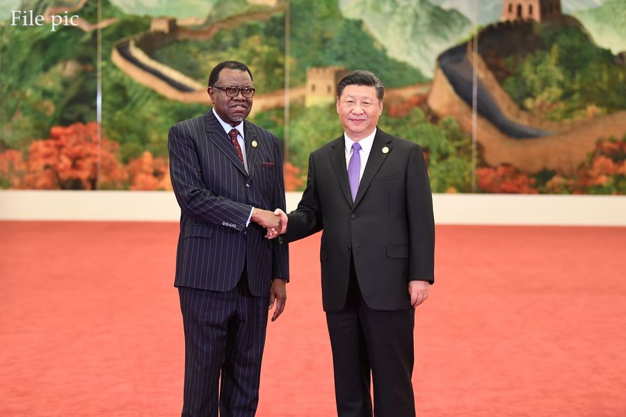 Chinese President Xi Jinping (R) welcomes Namibian President Hage Geingob, who is here to attend the 2018 Beijing Summit of the Forum on China-Africa Cooperation (FOCAC), at the Great Hall of the People in Beijing, capital of China, Sept. 3, 2018. (Xinhua/Yan Yan)