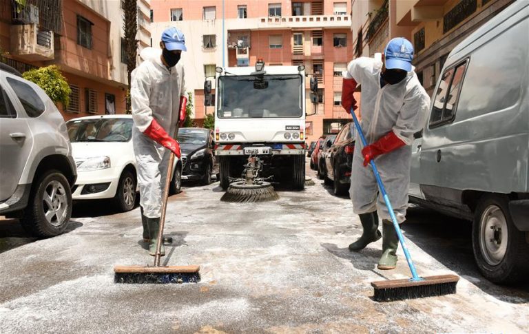 Health workers disinfect a public area in Casablanca, Morocco, on June 7, 2020. (Photo by Chadi/Xinhua)