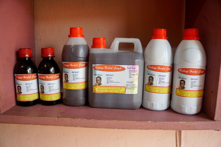 Photo Caption: At a kiosk outside Kampala, patients can buy medicines made from traditional herbs. Uganda’s government has launched a clinical trial of an herb-based treatment for COVID-19 (PHOTO/ NAKISANZE SEGAWA, GPJ UGANDA).