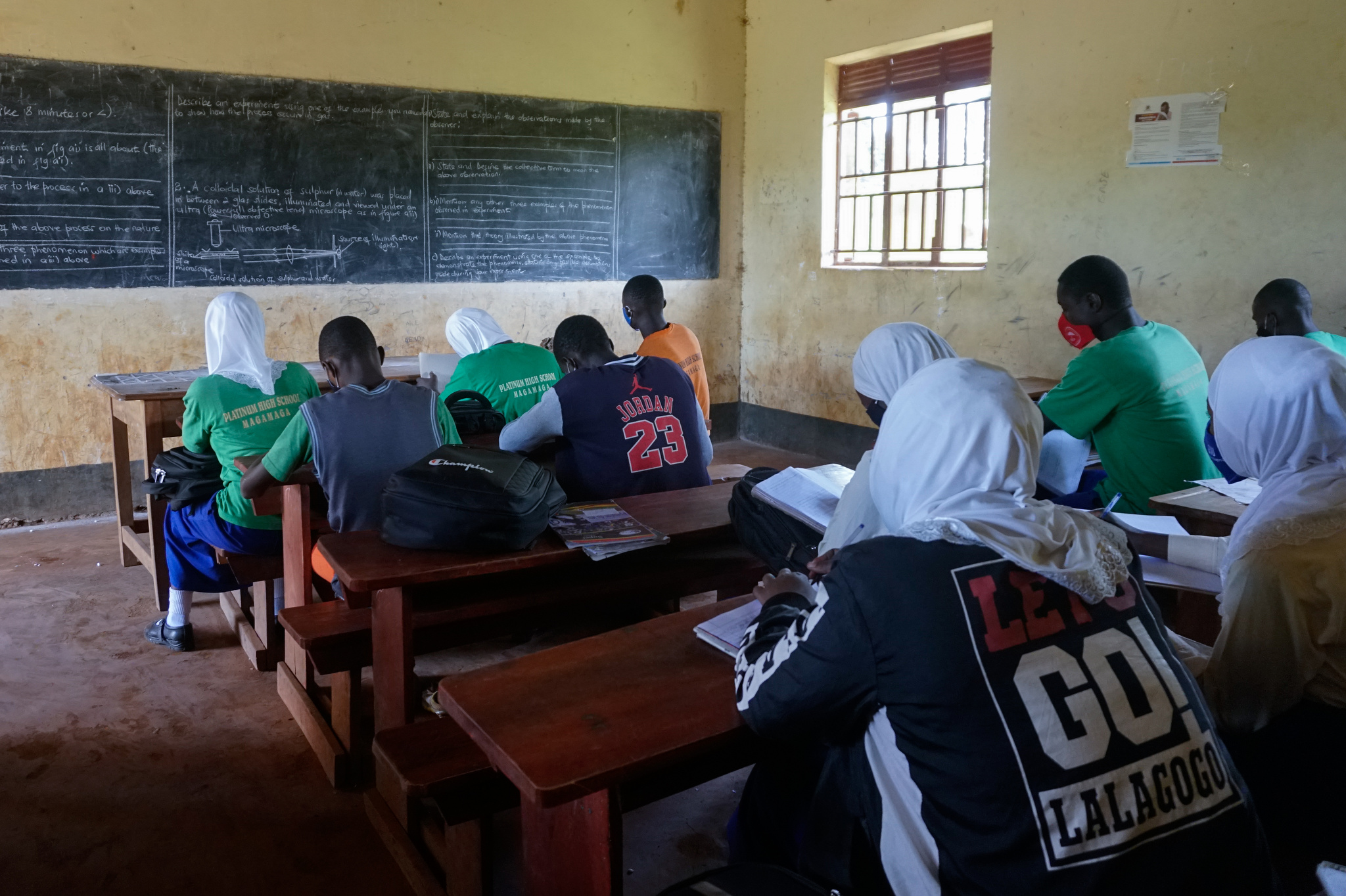 Students attend class at Platinum High School in Uganda’s Mayuge district before the recent lockdown. PHOTO BY APOPHIA AGIRESAASI, GPJ UGANDA