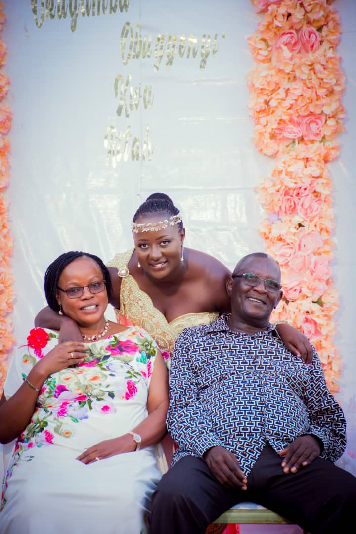 Ritah with her parents Mr & Mrs Fred Baketunga