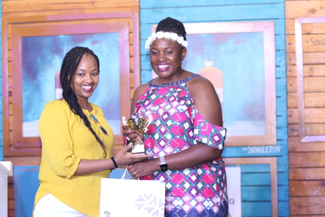 Ann Abeja receives her trophy