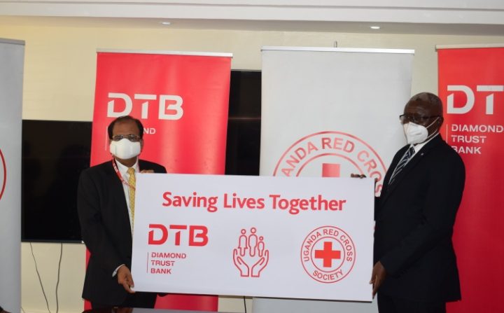 DTB Managing Director Varghese Thambi and Uganda Red Cross Society Secretary General Mr. Robert Kwesiga.