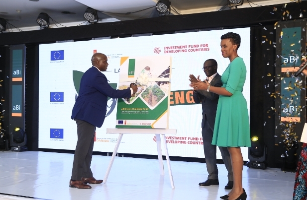 Mr. Felix Okoboi (L), Chair of the aBi Board, and, aBi CEO, Mona Muguma-Ssebuliba (2nd R) at the launch of the aBi UGX 7.5 billion Green Challenge Fund for Climate Change