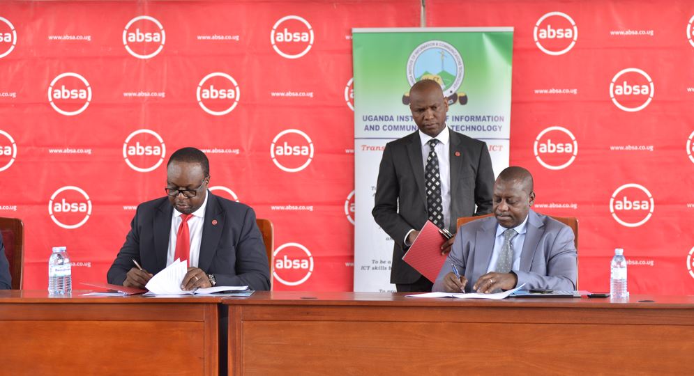 (L-R) Mumba Kalifungwa - Absa Uganda MD & Dr. Fredrick Kitoogo - Principal of Uganda Institute of ICT sign the MoU during the ceremony (PHOTO/Courtesy)