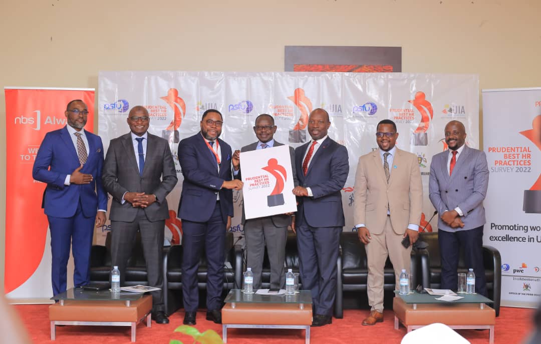 Tetteh Ayitevie (3rd R) CEO at Prudential Uganda, Owek. Apollo. N. Makubuya (3rd L)  Board Chair of Prudential Uganda, Uthman Mayanja( 2nd R) PwC Country Senior Partner, Patrick Okello (C) Commissioner for Human Resources, Office Of the Prime Minister with other partners and other officials at the launch of the Best HR Practices Survey 2022 to recognize organisations with Best HR Practices in Uganda.