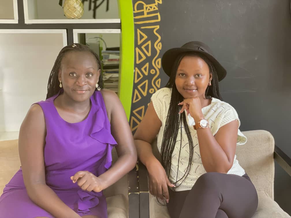 L-R: Lynn Nasirumbi and Martha Aheebwa winners of the Young Silverback awards in the PR competition category pose for a photo