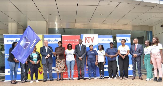  Winnie Lawoko-Olwe, Director, Domestic Investment Division, Uganda Investment Authority in the company of Tony Glencross, Managing Director, Nation Media Group Uganda, William Sekabembe – Ag. Chief Executive Officer and Managing Director and partners during the flag-off ceremony to Nairobi, for the 2022 winners of dfcu’s Rising Woman Initiative.