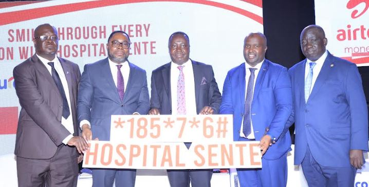 Japheth Aritho(c), Airtel Mobile Commerce Managing Director, Tetteh Ayitevie (2nd R), Prudential Uganda CEO,Hamza Mutebi(2nd L), General Manager Turaco with regulators from Bank of Uganda and The Insurance Regulatory Authority of Uganda at the Launch of  ‘Hospital Sente’, aimed at increasing access to insurance for underserved communities, and low-income individuals and families (PHOTO/Courtesy)