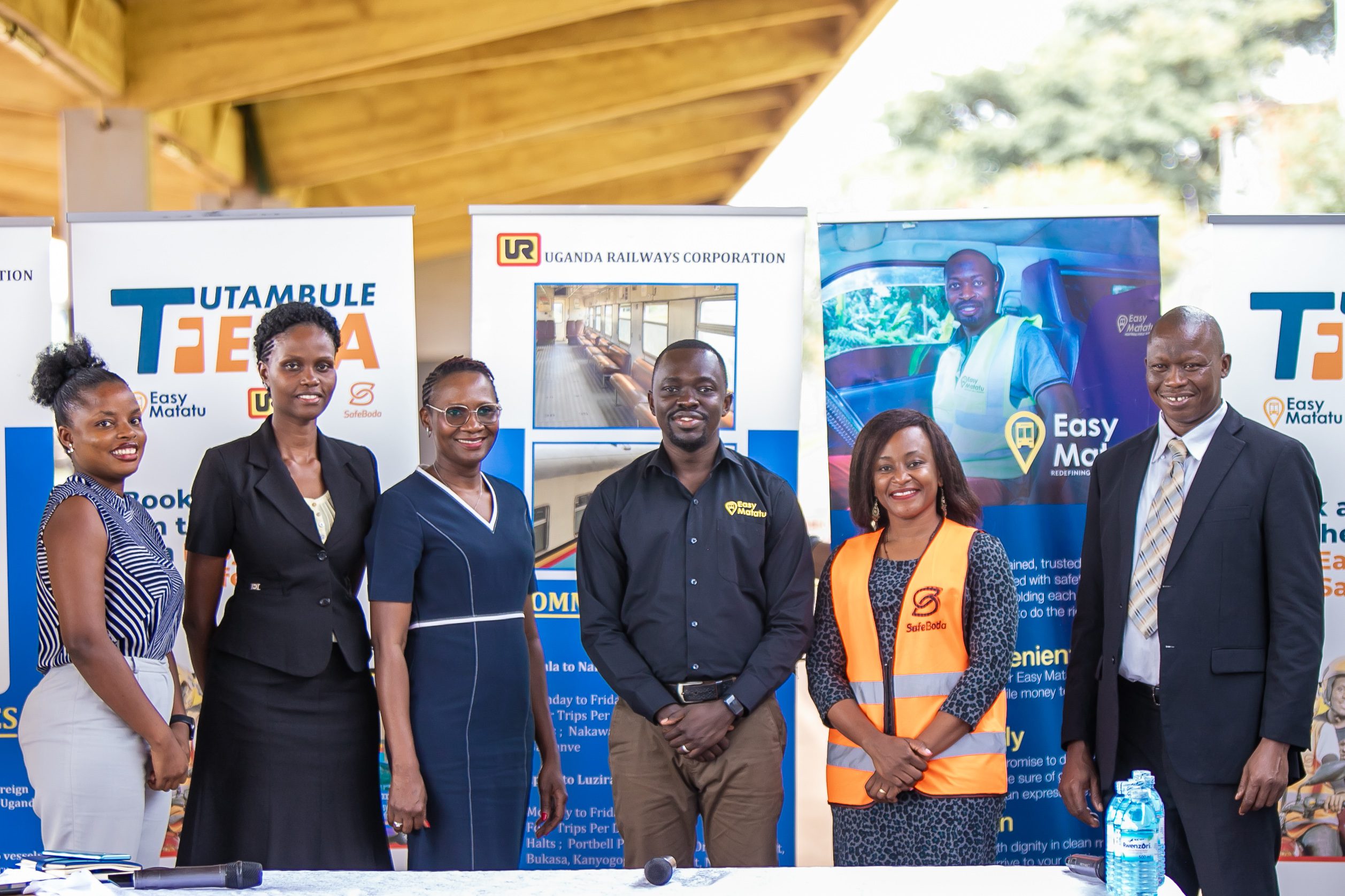 Staff of the Uganda Railway Corporation, SafeBoda and Easy Matatu pose for a photo at the launch of Tutambule Ffena pilot project