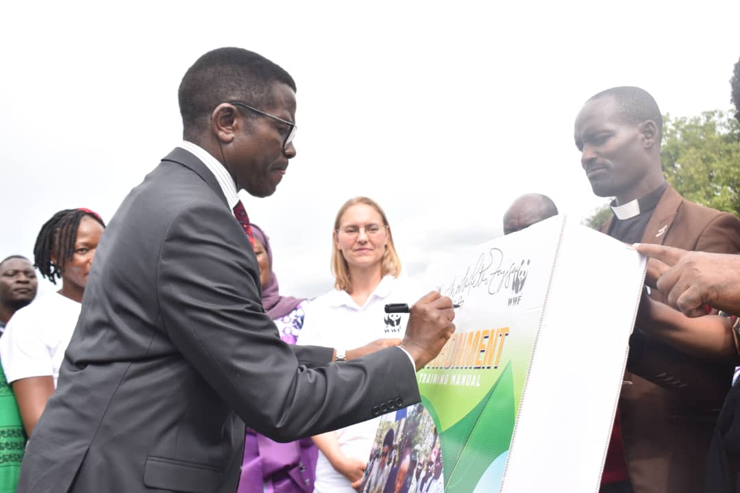 The Katikkiro of Buganda Kingdom, Mr Charles Peter Mayiga launches the environment training manual to provide to bolster conversation works within the Kingdom (PHOTO/PML Daily)