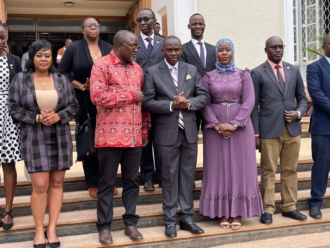 Some of the members of the Buganda Kingdom Royal Regatta pose for a group photo with Owek. Henry Kiberu, the Buganda Kingdom Sports Minister.