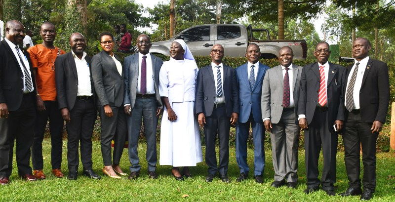 Head of the RDC secretariat Sister Mary Grace Akiror (Centre) posing for a photo with some of the participants including the NEMA Board Chair Prof. James Okot-Okumu (5th left). On her left are NEMA Executive Director, Dr. Barirega Akankwasah, and NEMA Board Members Eng. Yorokamu Katwiremu, Dr. John Ekure and Mr. Can Amos Lapenga.