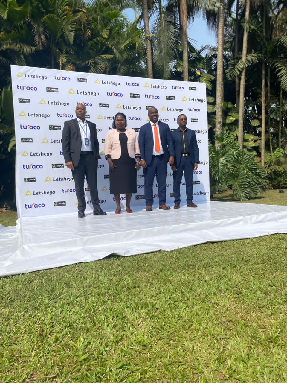 L-R Giles Aijukwe (CEO Letshego Uganda), Vanessa Muhwezi (UMRA Manager Compliance), Hamza Mutebi (GM Turaco Insurance) and Kevin Katete from IRA pose for a photo after Letshego unveiled its latest LetsGo Insure solution.