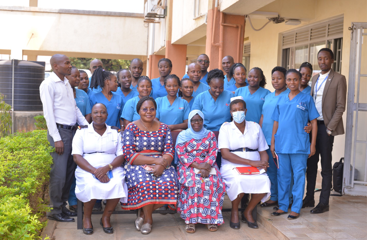 Mbarara referral hospital officials and MUST senior lectures in a group photo with students offering Master in Nursing science