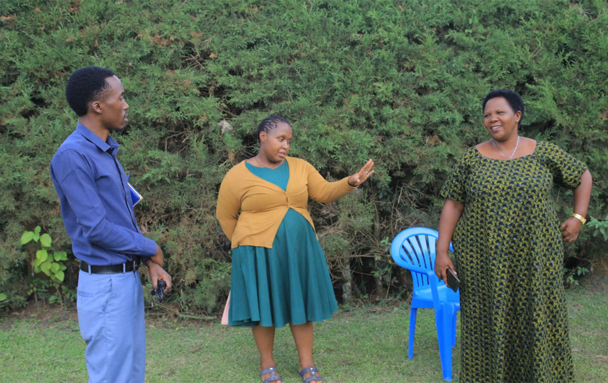 Mrs. Allen Wambooka [right] sharing her story with Mbarara Regional Referral Hospital Staff. She was among those trained on how to mediate GBV cases.