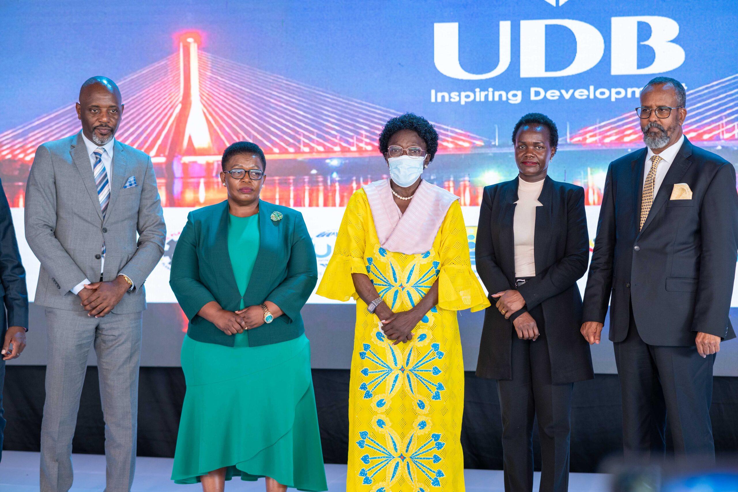 1st Deputy Prime Minister and Minister of East African Community Affairs, Rt. Hon. Rebecca Kadaga Alitwala (C), Managing Director of Uganda Development Bank, Patricia Ojangole (2nd R), 2nd Deputy Prime Minister of Busoga, Osman Noor Ahmed (R), Executive Director, National Planning Authority, Dr.Joseph Muvawala(L), Minister Office of the Prime Minister (General Duties), Justine Kasule Lumumba(2nd L) having a photo moment at the 2023 Busoga Investment Forum organised by Uganda Development Bank at Jinja Civil Service College to accelerate an inclusive and sustainable socio-economic transformation of the Busoga region.