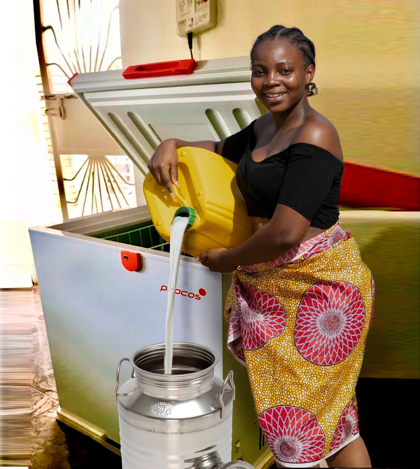 Nyangabyaki Justice a diary farmer from Rusheere using a solar powered fridge.