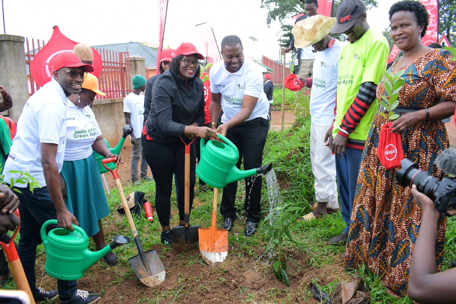 Absa's Helen Nangonzi and Brian Kaboyo