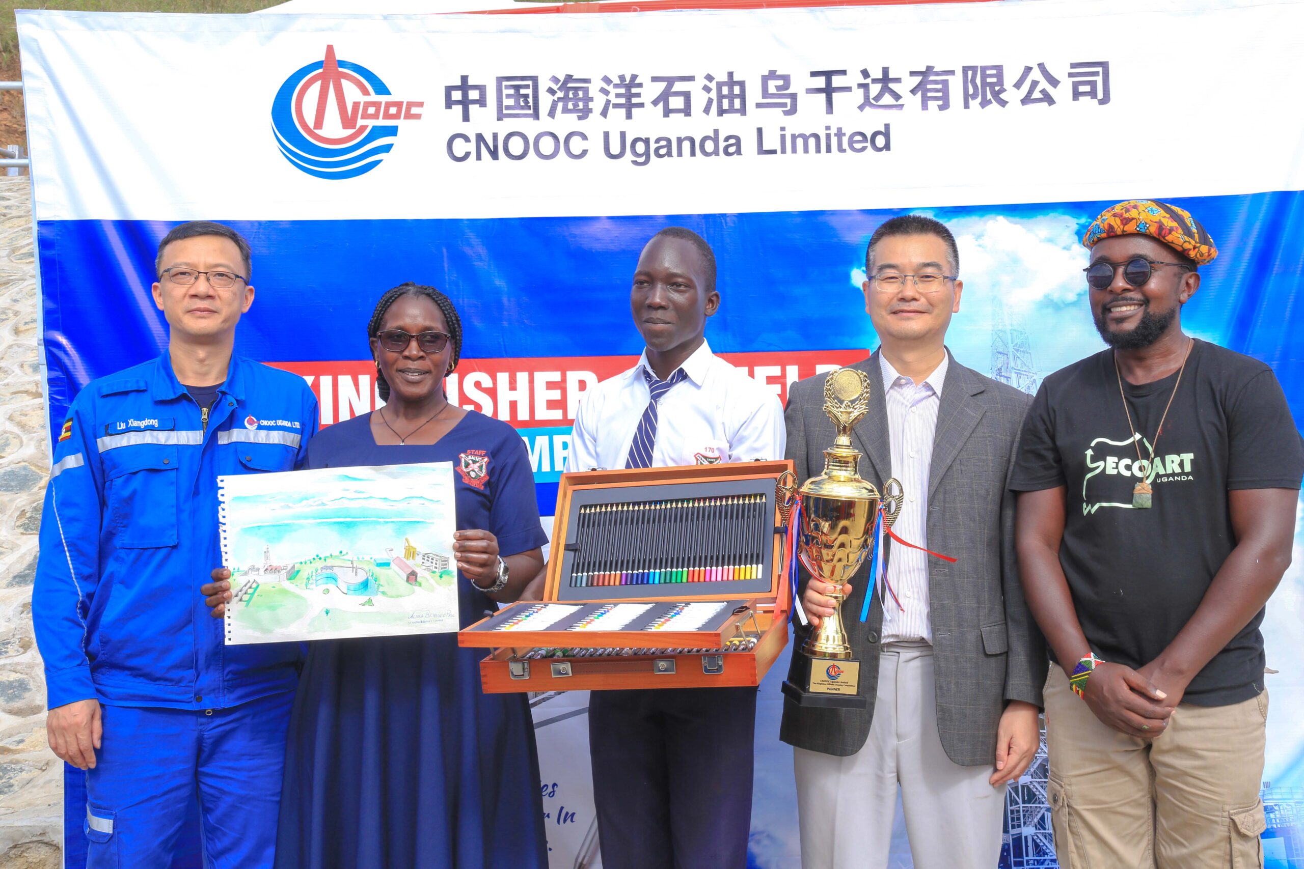 (L-R) Mr Liu Xiangdong the CNOOC president, Mary Muhumuz, Aliker Bethuel Paul-the competition winner and Mr. Fan Xuecheng-Minister Counselor Chinese Embassy and Ruganzu Bruno, founder Ecoart pose for a photo.