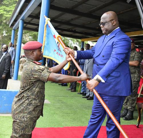 Major General Kabi Kiriza receives the standard command from the President of the Republic Félix Tshisekedi (PHOTO/DRC Presidency