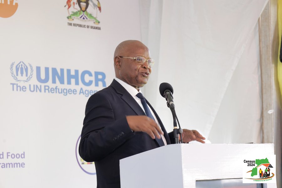 Dr. Chris N. Mukiza, Executive Director and Census Commissioner of the Uganda Bureau of Statistics (UBOS), addresses the press during the release of the 2024 National Population and Housing Census preliminary results at Serena Hotel, Kampala. Dr. Mukiza highlighted the success of the census, which showed a significant increase in population size and a shift towards urbanization. He also acknowledged the challenges faced during the enumeration phase and expressed gratitude to the government, stakeholders, and the public for their support