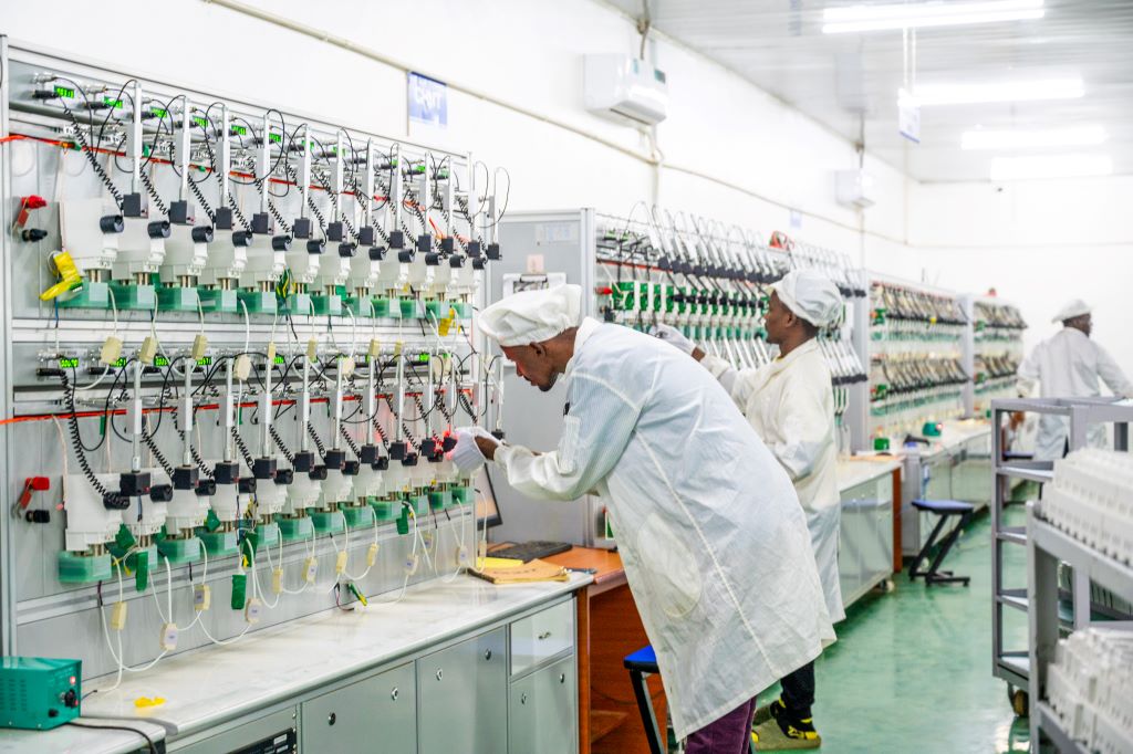 Ugandan youth at Chint Electricals and Meters in Mbale Industrial Park assemble sophisticated electric meters, demonstrating their expertise and precision. With skills acquired through practical training, they manufacture high-quality products, boosting Uganda's economic development and their own confidence and self-sufficiency.