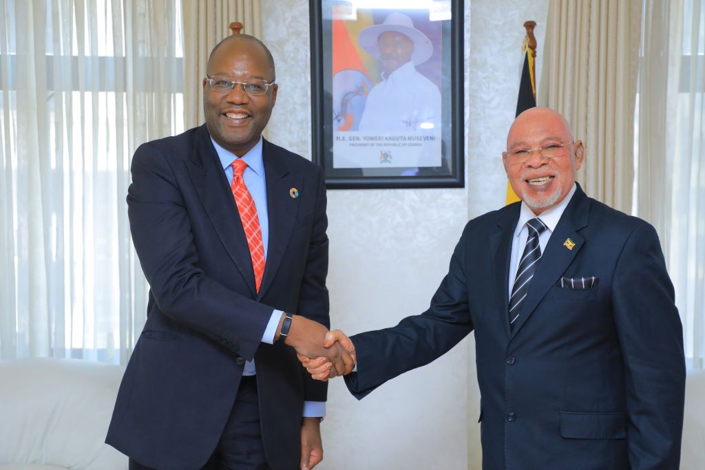 UN Resident Coordinator Leonard Zulu (left) meets with Uganda's Minister of Foreign Affairs, General Odongo Jeje Abubhaker (right), to discuss the country's refugee response and humanitarian efforts. Kampala, Uganda.