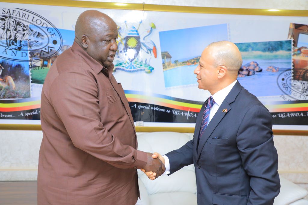 Minister of State for International Affairs, Hon. Oryem Henry Okello (left), shakes hands with Egypt's Ambassador to Uganda, Monzer Selim, as they reaffirm their commitment to strengthening bilateral relations between the two nations.