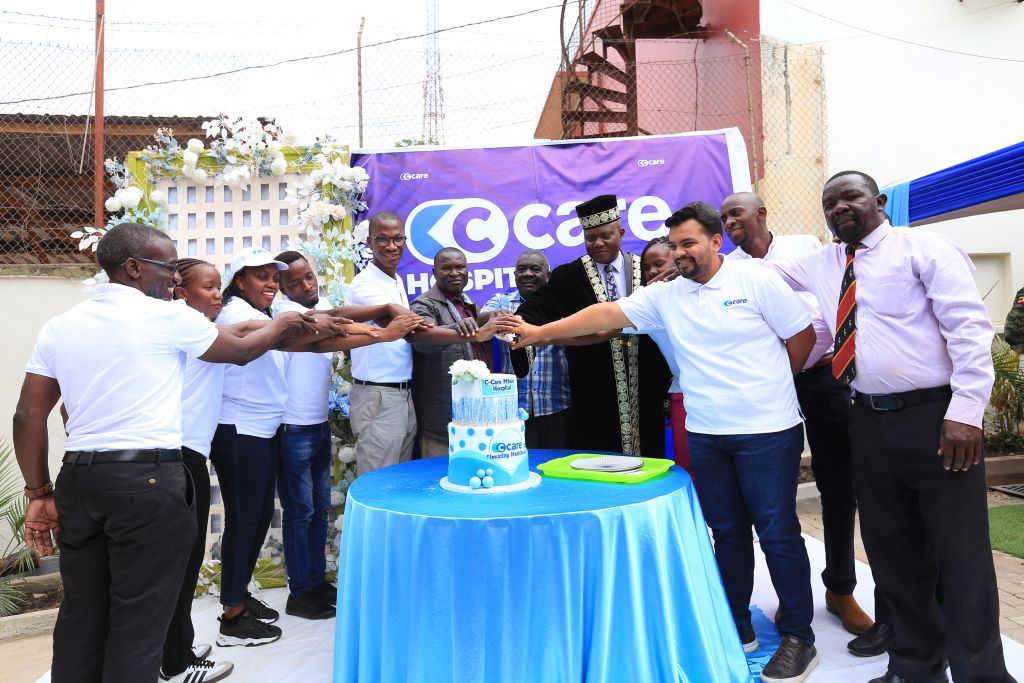 His Royal Highness Omukuka III Jude Mike Mudoma, Azhar Sundhoo, CEO of C-Care Uganda, and other dignitaries cut a cake to mark the official launch of C-Care's state-of-the-art facility in Mbale, Uganda