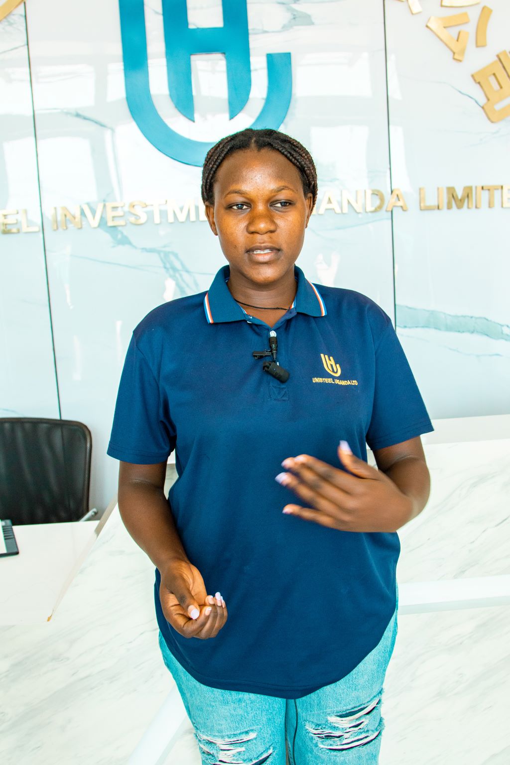 Florence Nabutere, an administrative assistant at Unisteel, is one of many Ugandan women who have found financial independence and a new sense of purpose through employment at Chinese-owned companies in Uganda.